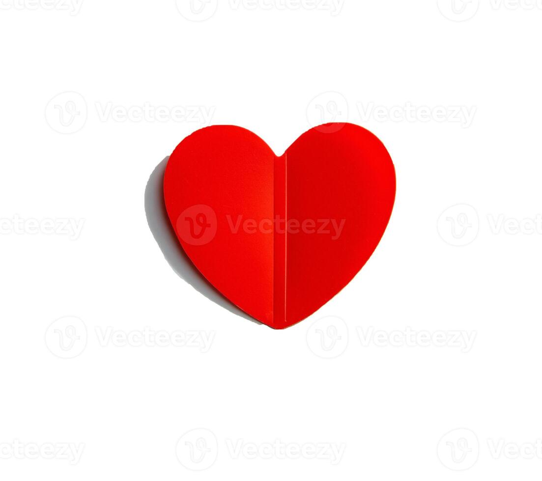 Isolated on a white background, red paper heart with shadow, on Valentine's Day photo