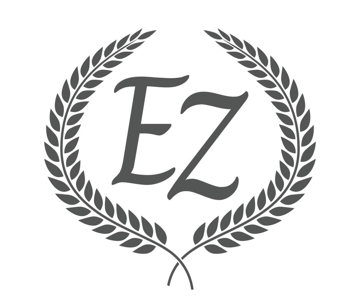 Initial letter E and Z, EZ monogram logo design with laurel wreath. Luxury calligraphy font. vector