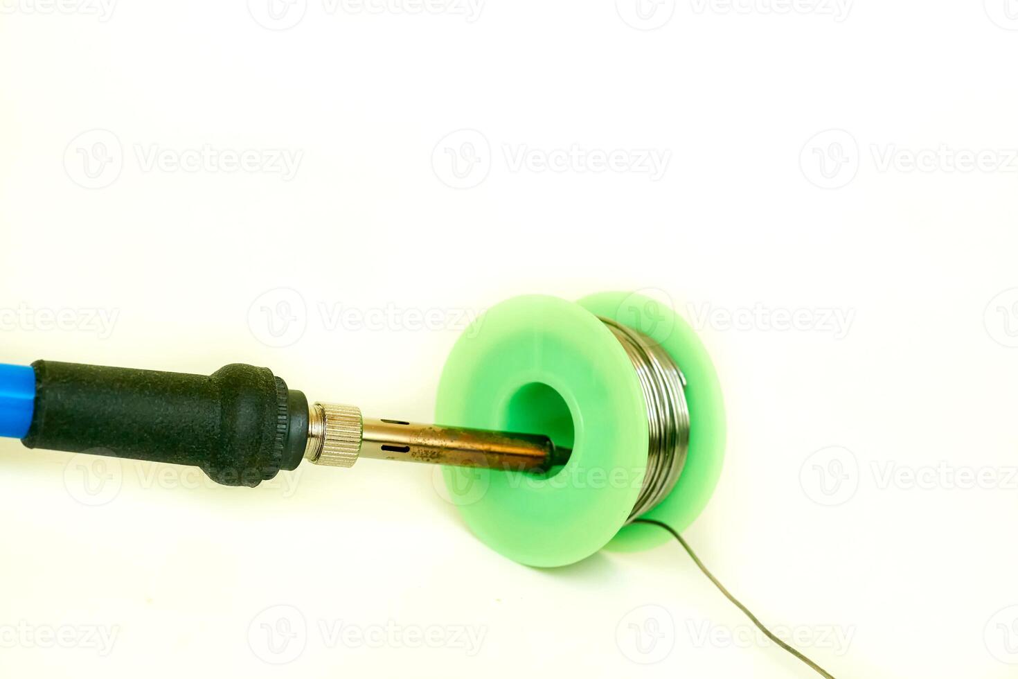 Soldering iron.Repair radio equipment,solder in coil photo