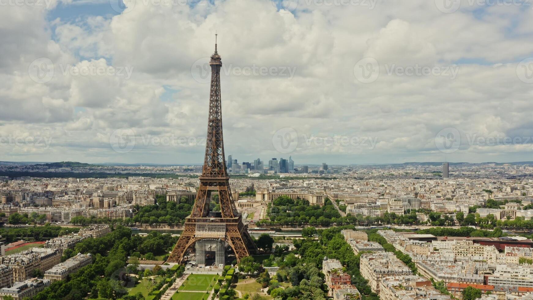 Drone horizontal panning view of the historic center of Paris with the Eiffel Tower in the foreground on a summer day. France Paris photo