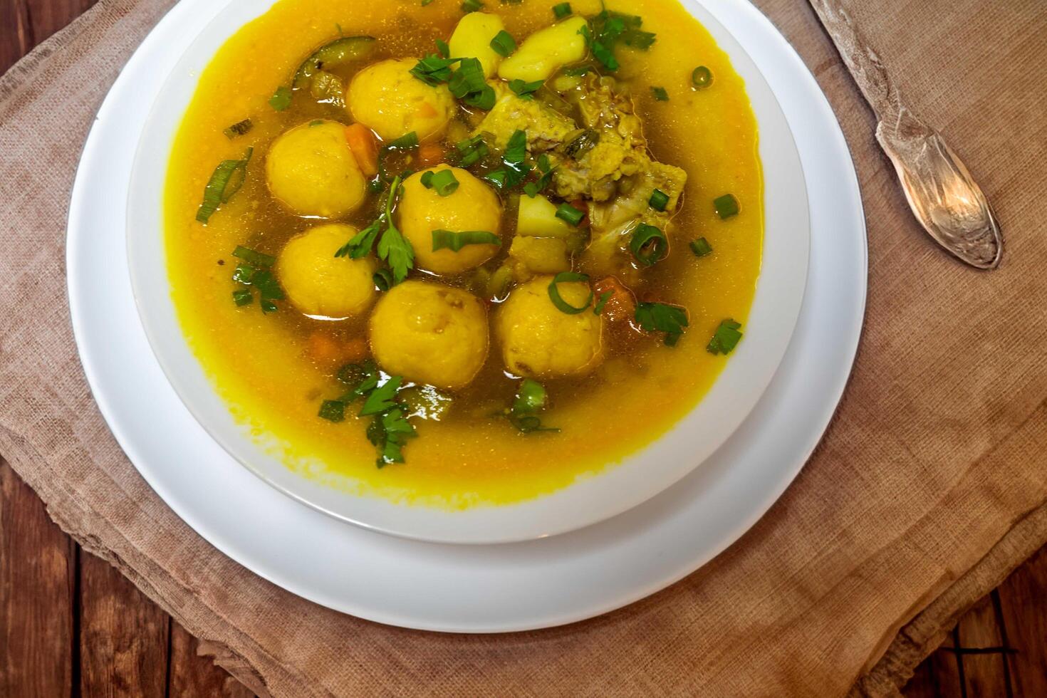 The iconic and traditional Paraguayan soup known as vori-vori or bori-bori, is the best soup in the world. Special soup for cold winter nights. details top view photo