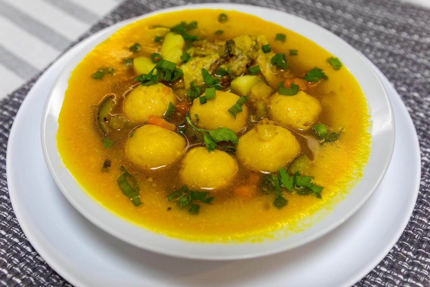 The iconic and traditional Paraguayan soup known as vori-vori or bori-bori, is the best soup in the world. Special soup for cold winter nights. gorgeous plate photo