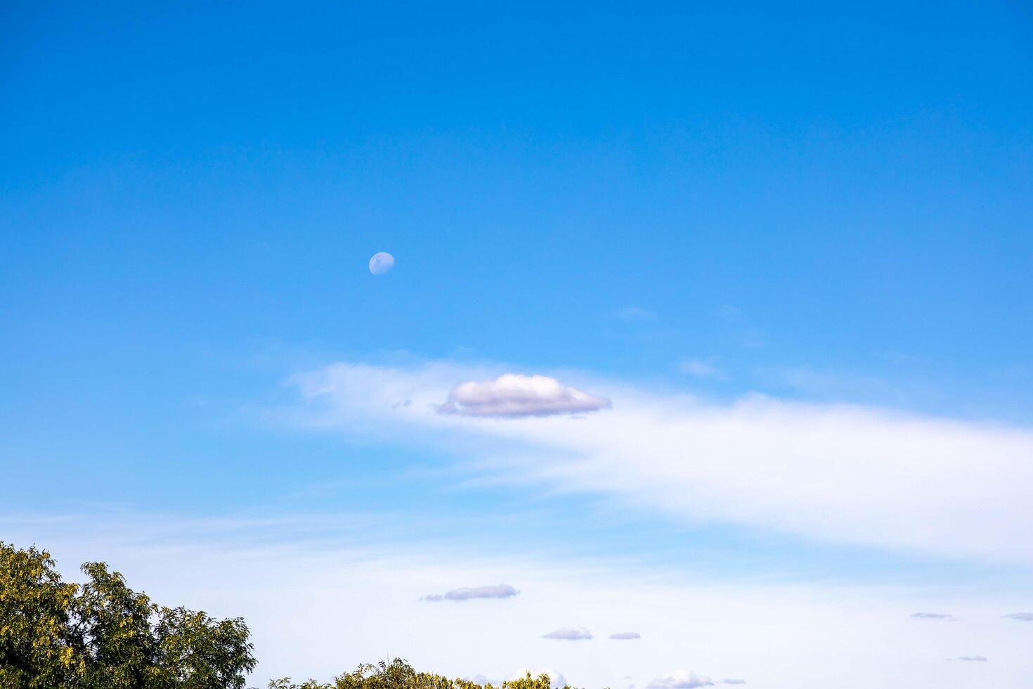 The Moon in the Blue Sky with Clouds panoramic photo