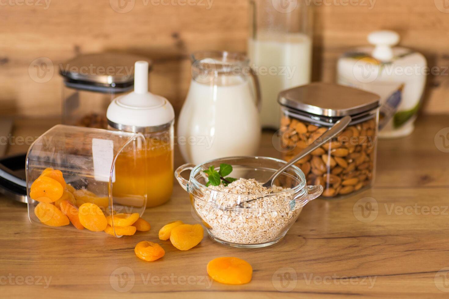quick breakfast of oatmeal with dried fruits and nuts. photo