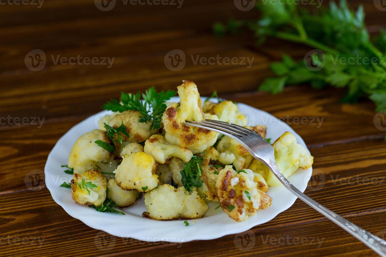 Vegetable dish of fried cabbage with aromatic spices. photo