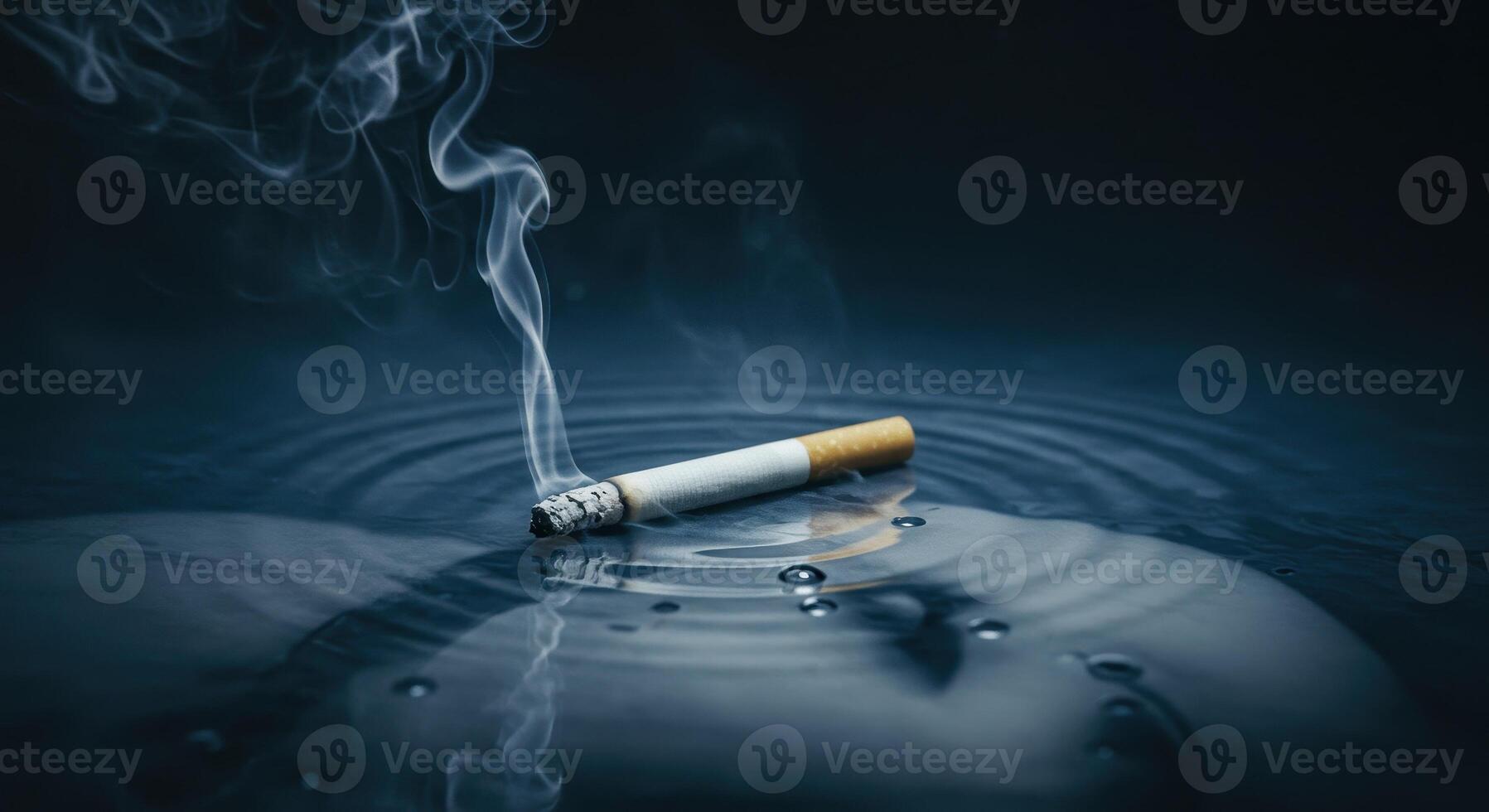 Lit Cigarette Floating on Dark Water Surface with Rising Smoke and Spreading Ripples photo