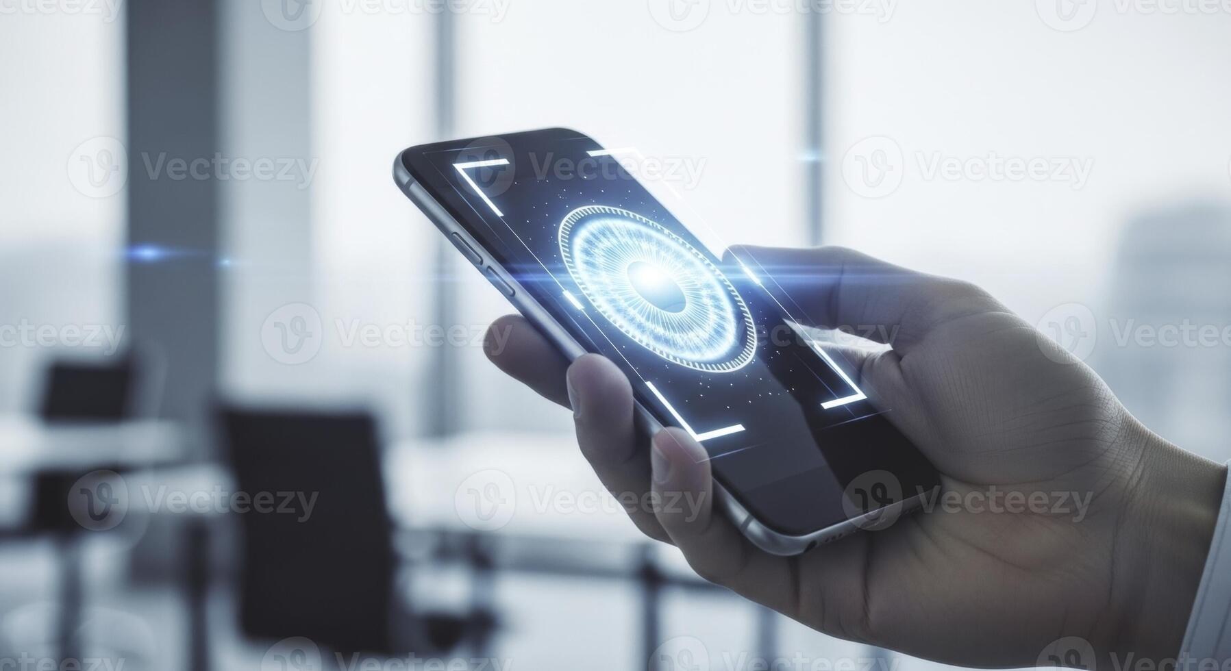 Man hand holding a smartphone displaying a glowing biometric iris scan for digital security photo