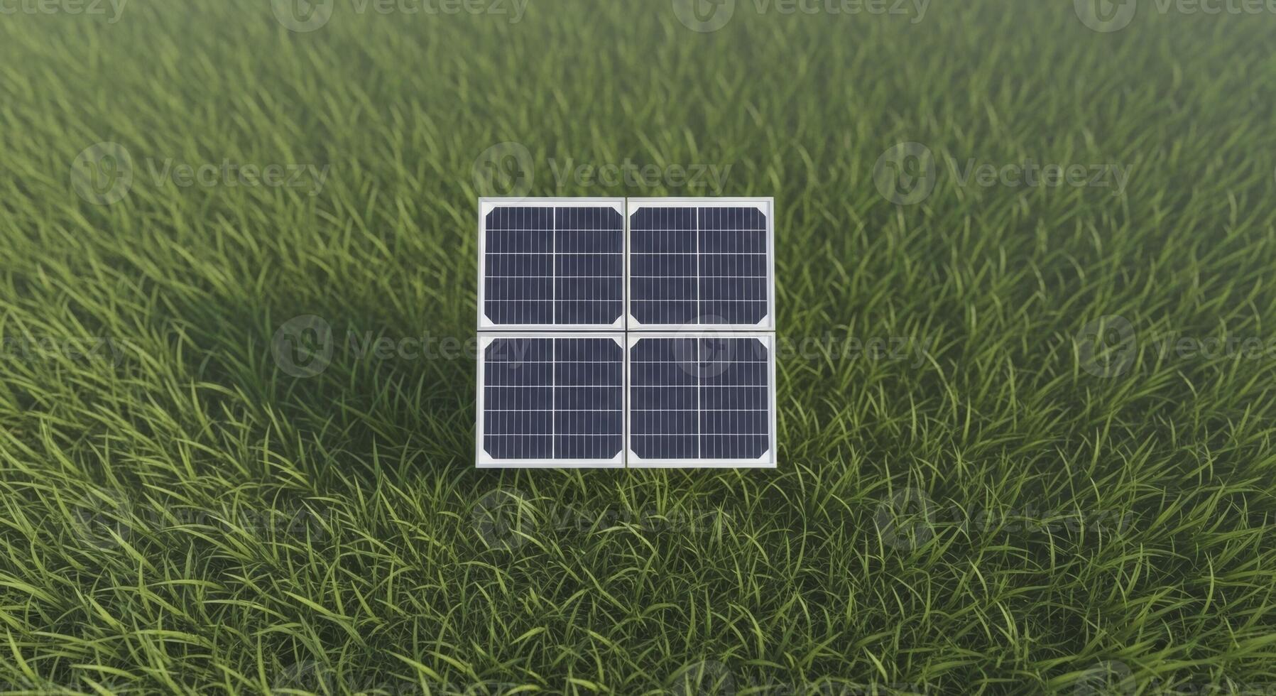 Small square solar panel array on green grass field from an overhead perspective photo