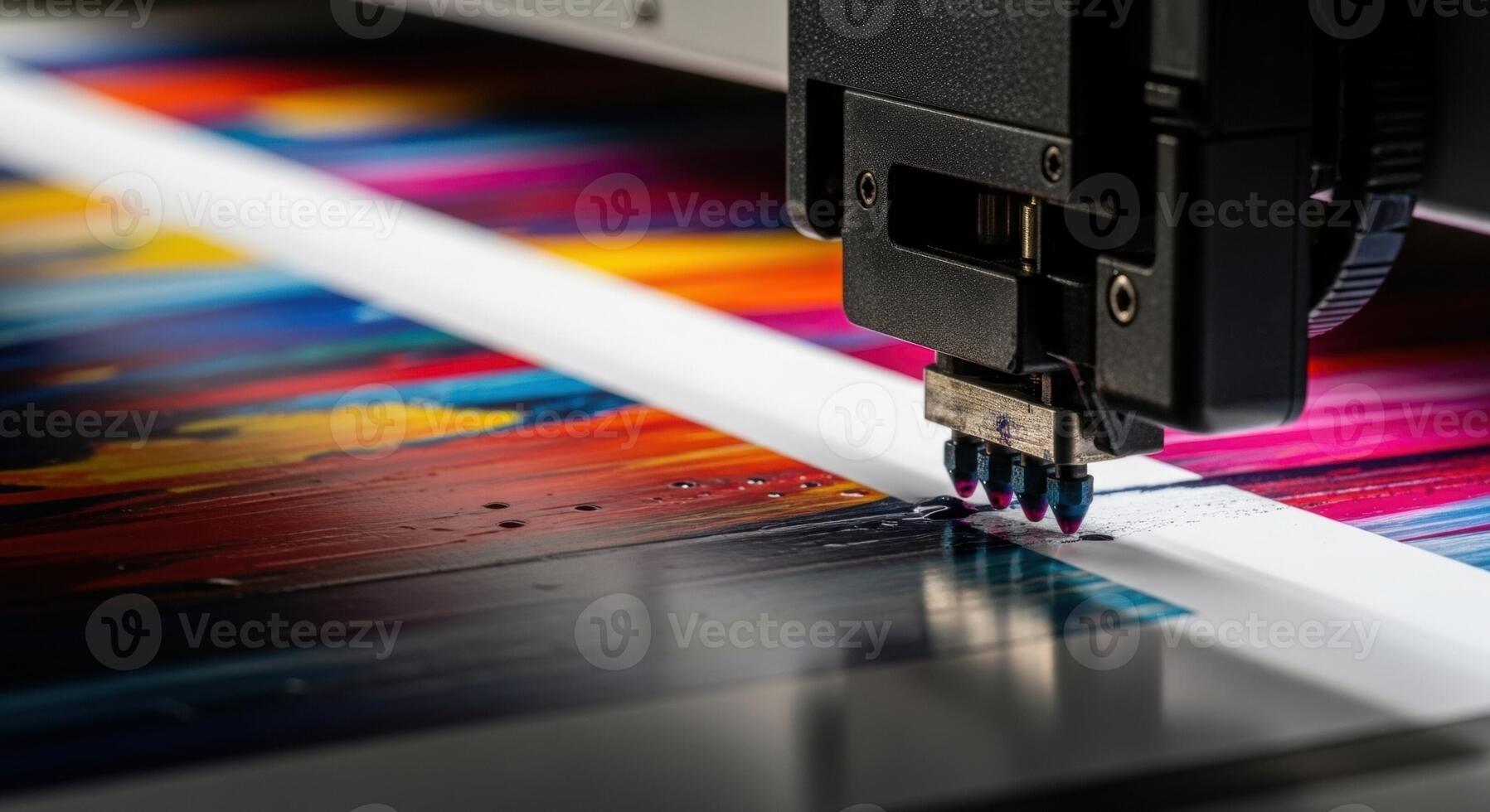 Close up of an industrial printer head applying vibrant ink colors to create a colorful design photo