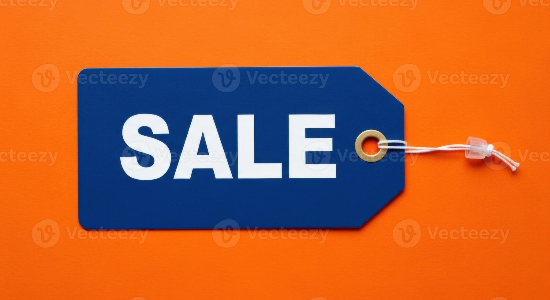 Blue Sale Price Tag with White Text on a Vibrant Orange Background photo