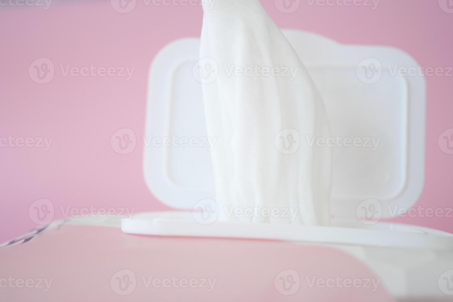 Creamy white substance flowing from a container photo