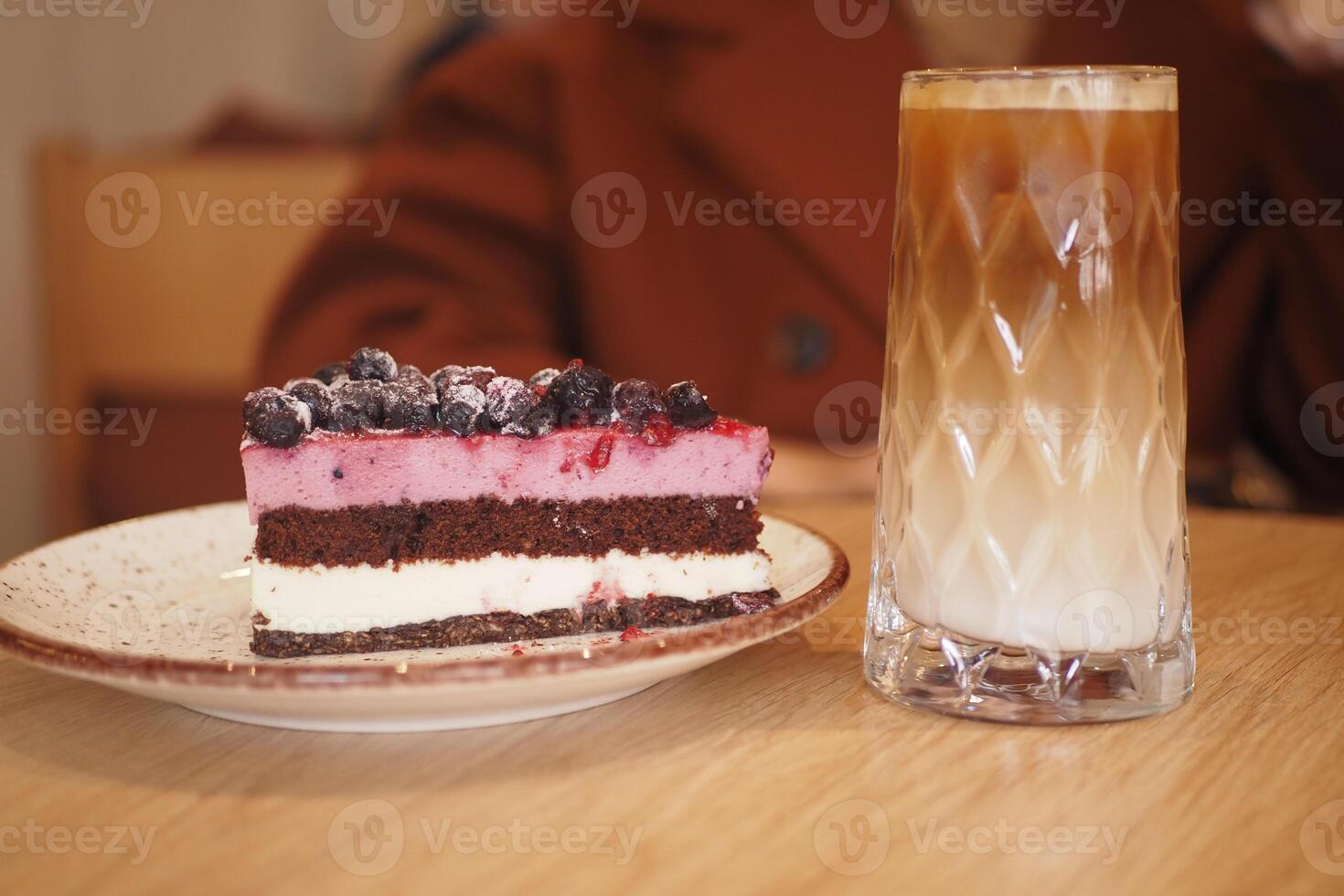 Delicious dessert and coffee enjoyed in a cozy cafe photo