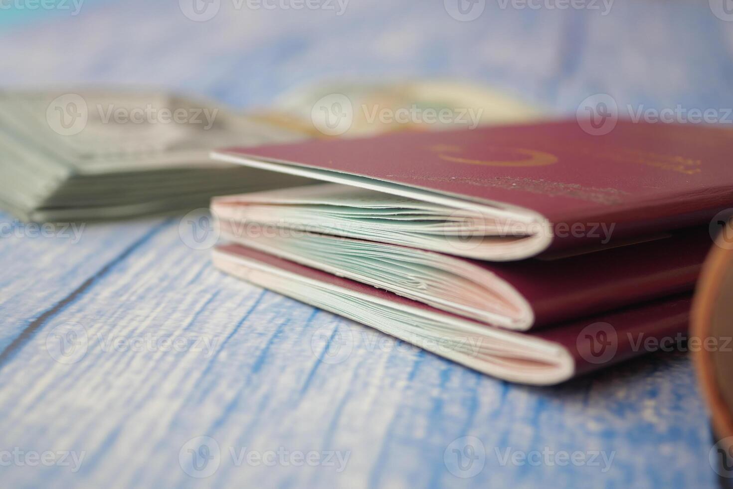 Travel preparations with passports and cash on a table photo