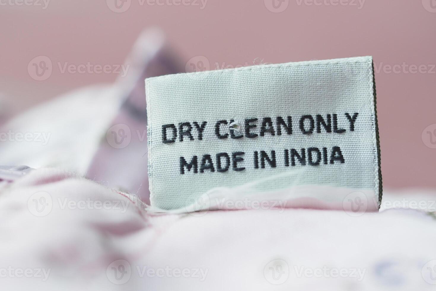 Dry clean only label on fabric made in India photo