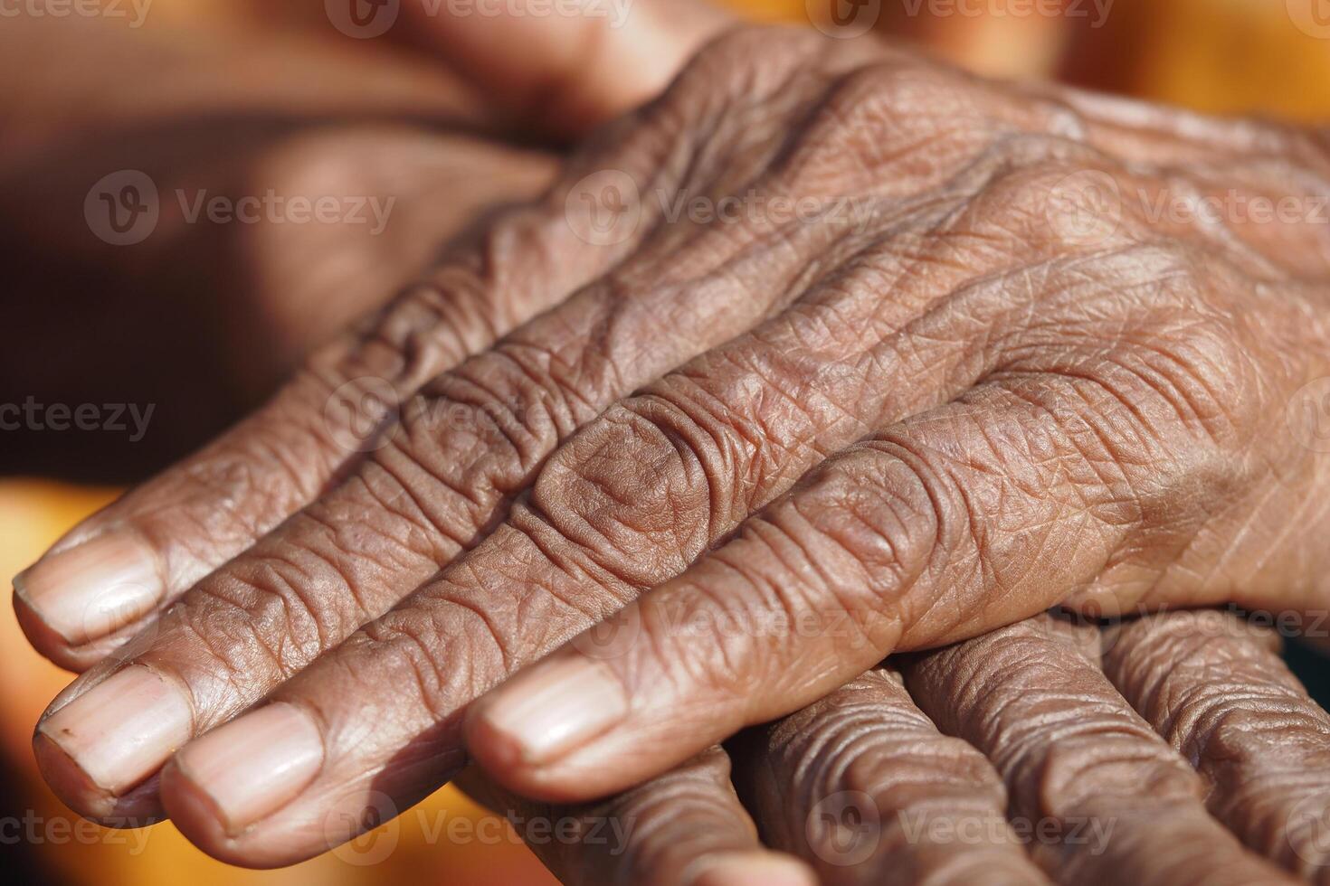 Wrinkled hands show time's passage photo