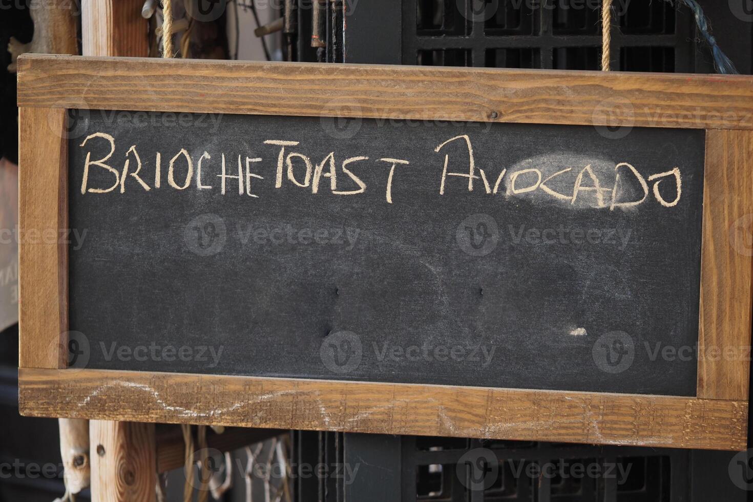 Delicious brioche toast with avocado showcased at a cafe photo