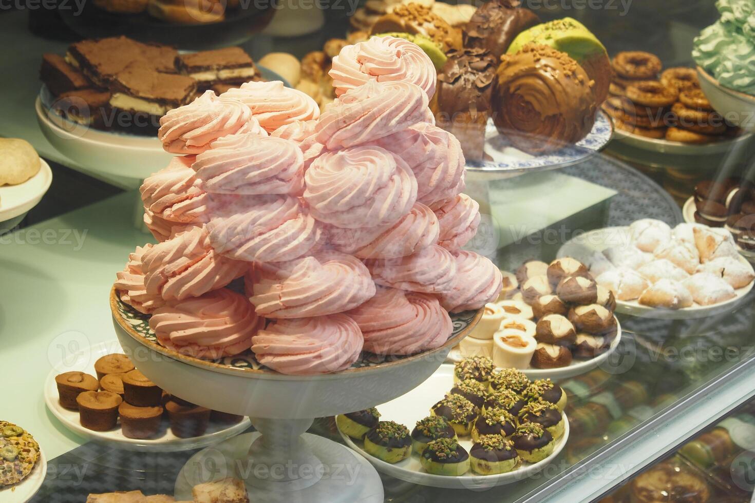 Sweet treats displayed in a bakery showcase photo