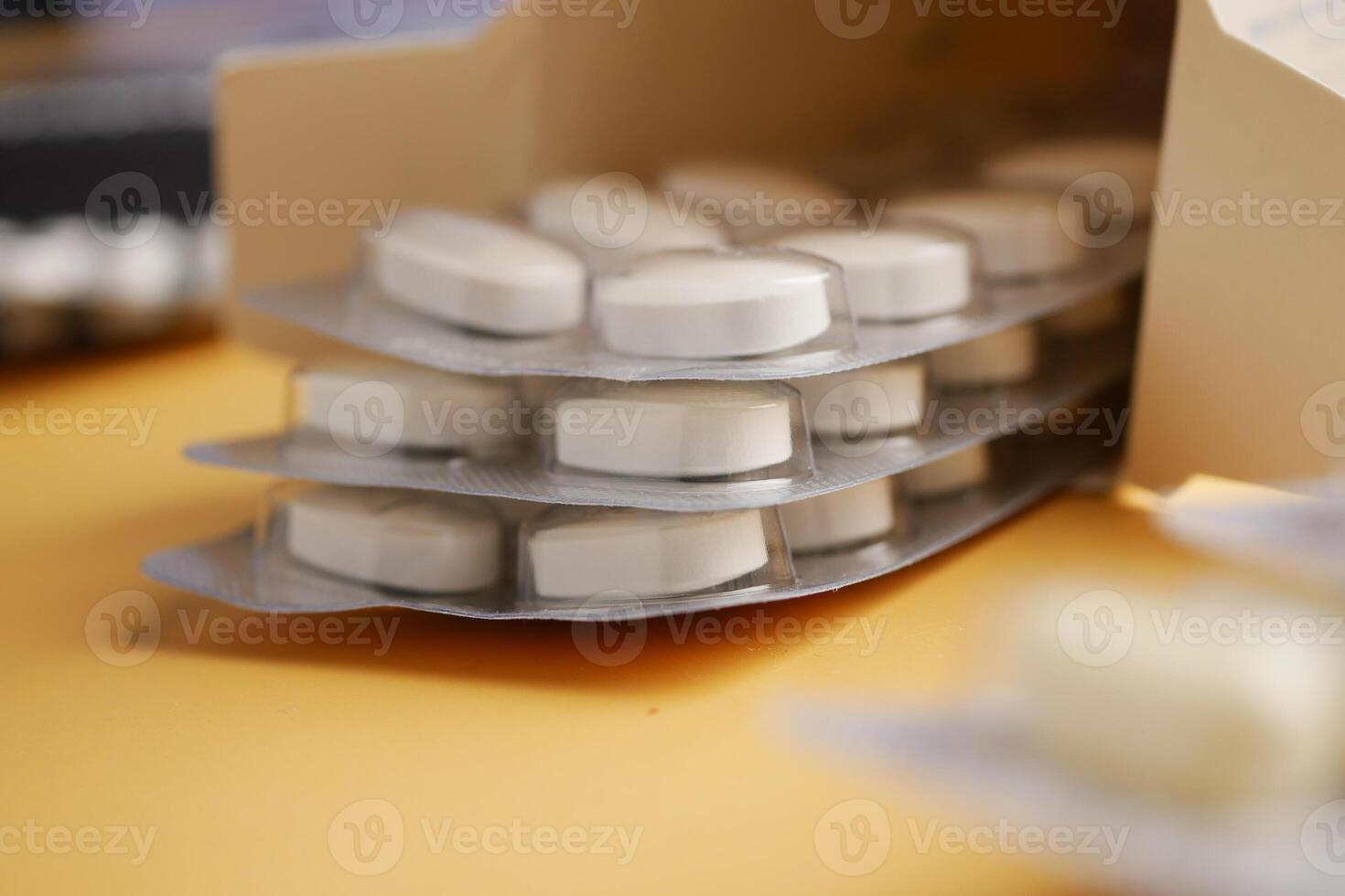 Close-Up of Person Inserting a Soft Foam Earplug into the Ear photo