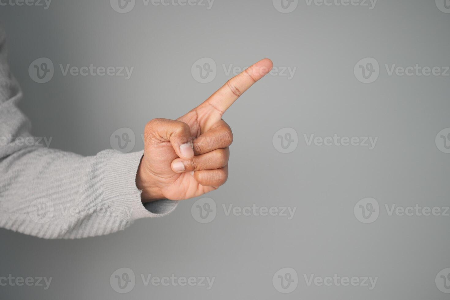 Finger pointing gesture indicating a key idea or suggestion photo