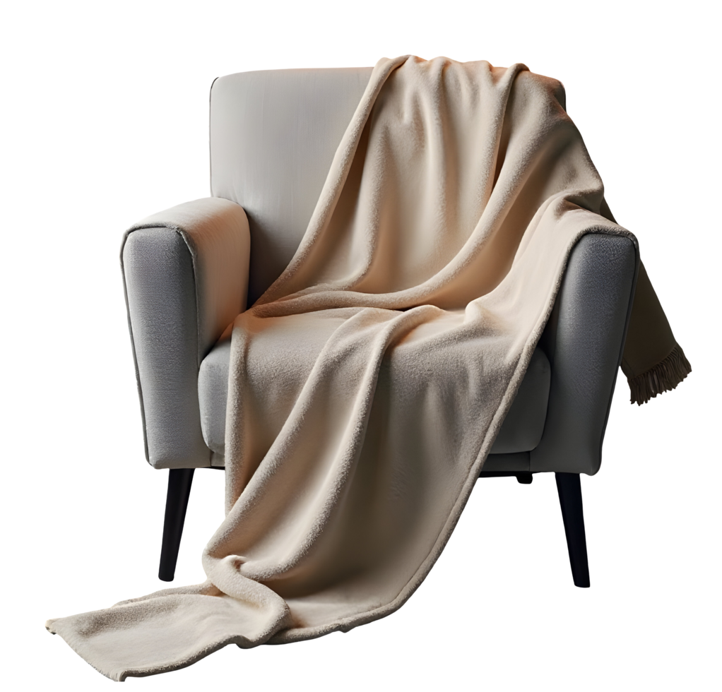 Cozy armchair with soft beige blanket draped over it creating warm inviting feel png