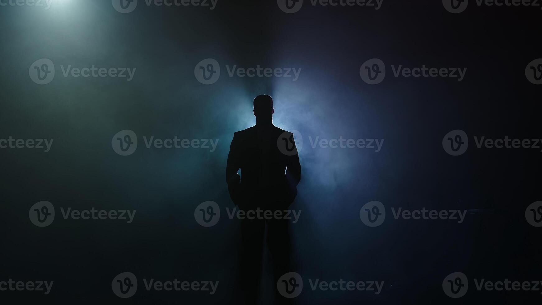 Dark backlight shadow silhouette of male person, incognito. Night smog and smoke. Mystery background, banner, free copy space photo