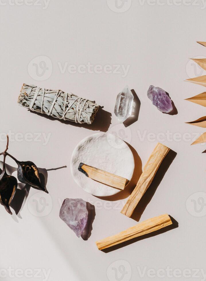 White sage and Palo Santo and amethyst and quartz crystal photo