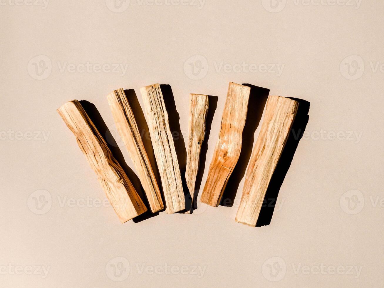 Wooden sticks Palo Santo on light background photo