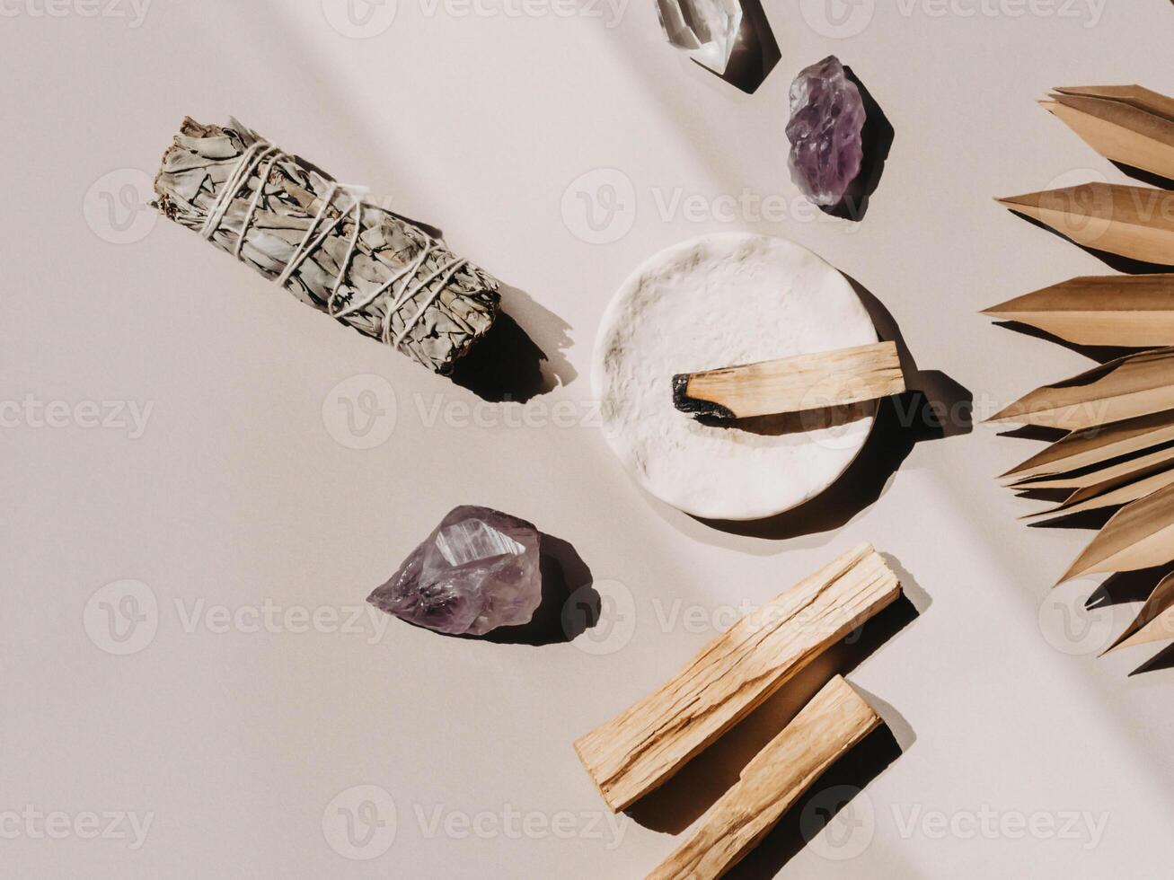 Sage and Palo Santo and amethyst and quartz crystals photo