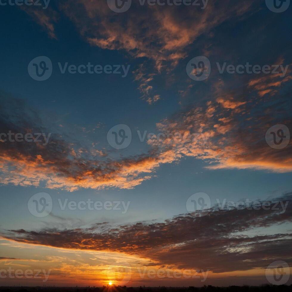 A beautiful sunset featuring many clouds scattered across the sky photo