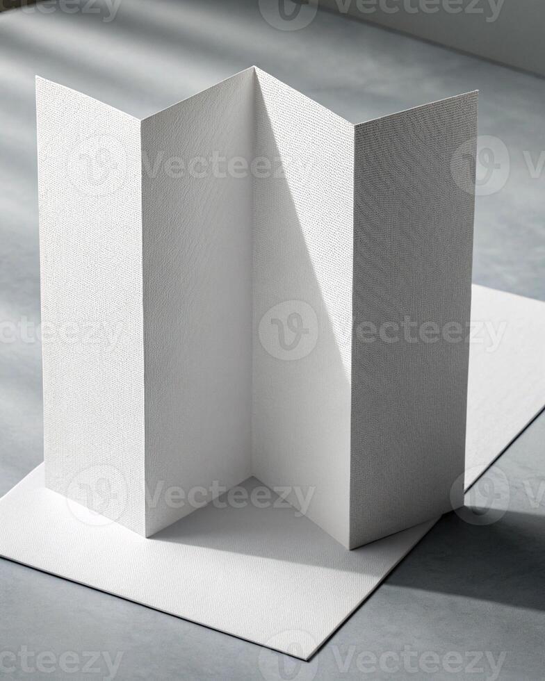A folded white card on a table photo