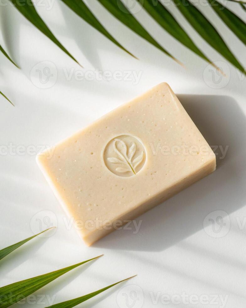 A soap bar with a leaf on it photo