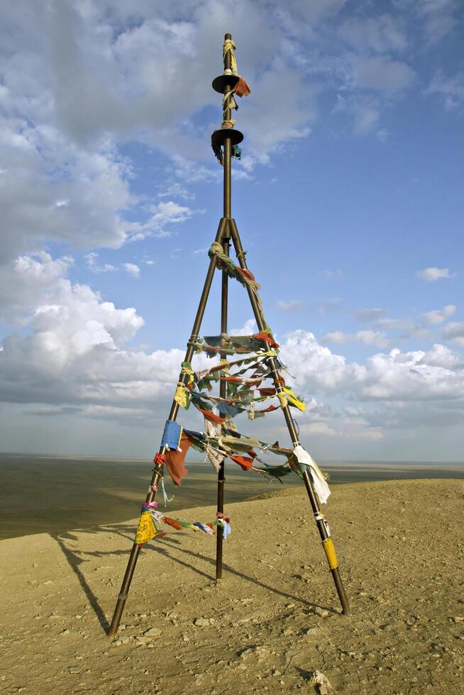 Triangulation mark with prayer flags photo