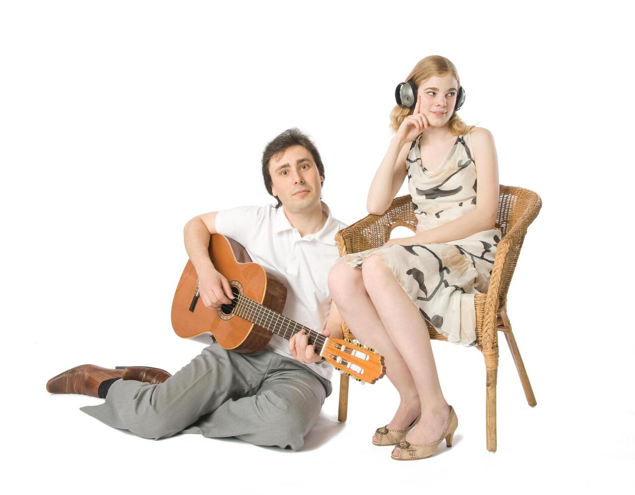 Man serenading to an uninterested girl girl photo