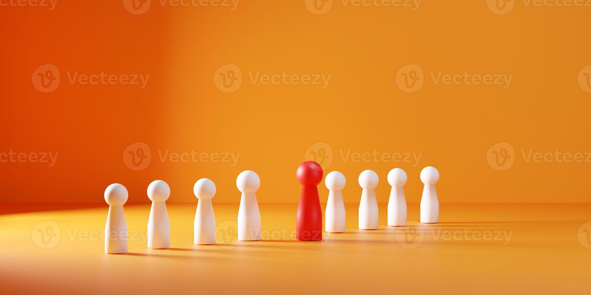 Leadership and talent management concept with a red wooden figure standing out from the crowd. Perfect for themes of HR human resources, teamwork performance, recruitment, and business success. photo
