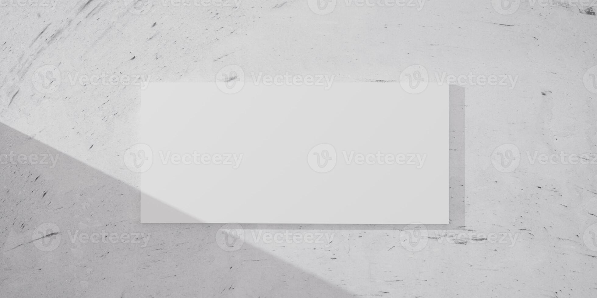 Minimalist white canvas on a marble wall with dramatic light and shadow play. Blank template for creative artwork, photography, print display in contemporary home or office interior design. 3d render. photo