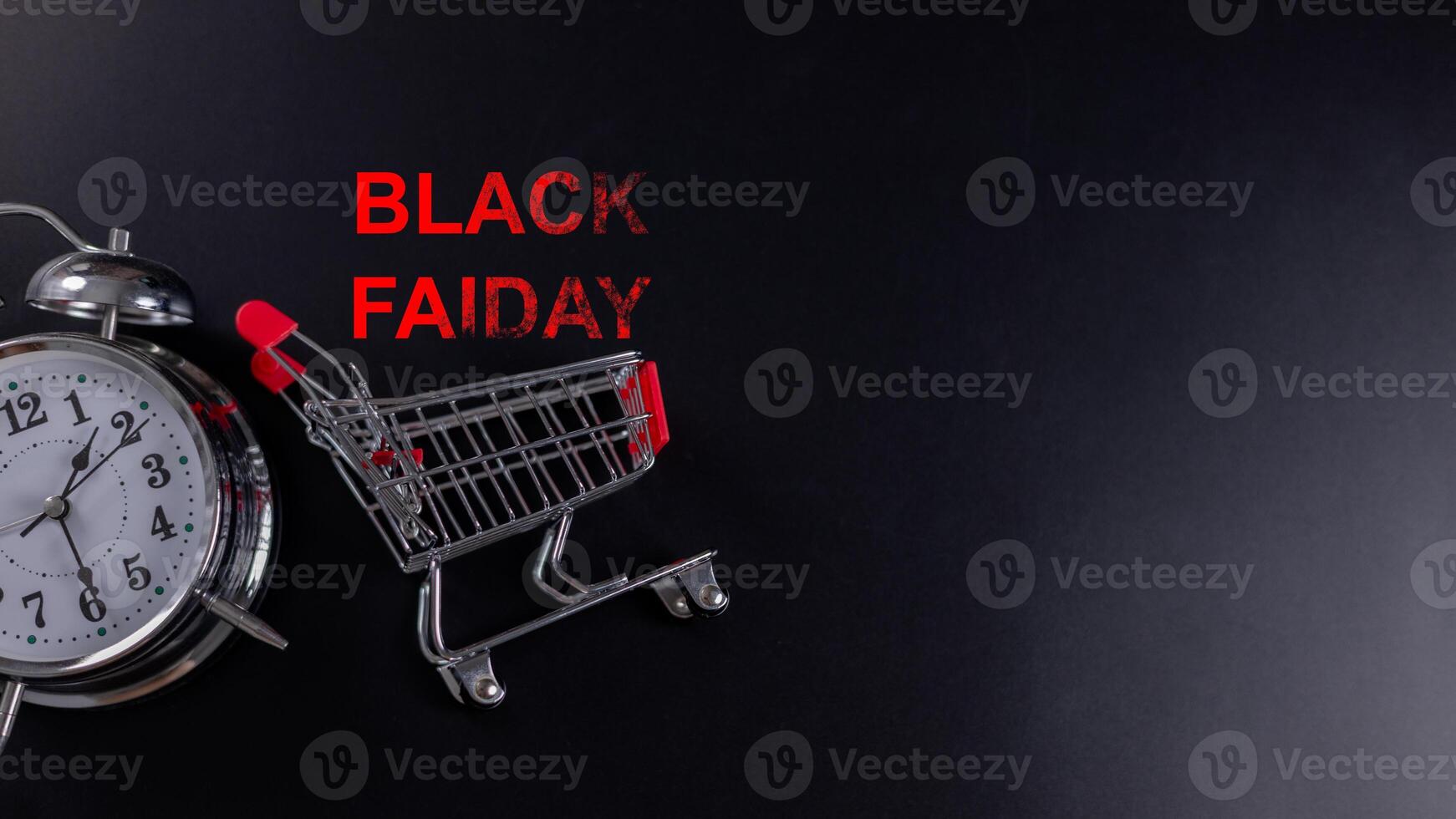 Alarm clock and shopping cart with BLACK FRIDAY text, symbolizing time-sensitive sales, holiday shopping urgency, and e commerce promotions. Discount events, retail marketing, and urgent deals. photo