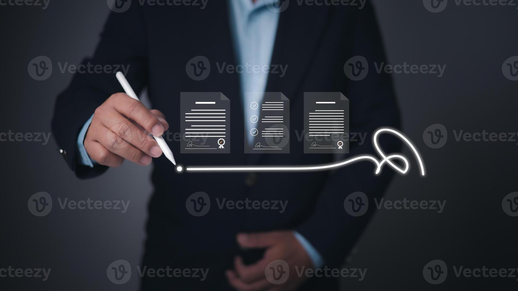 Businessman using a digital pen to sign electronic documents, symbolizing e-signatures, paperless contracts, and secure online agreements, legal technology, and streamlined document management. photo