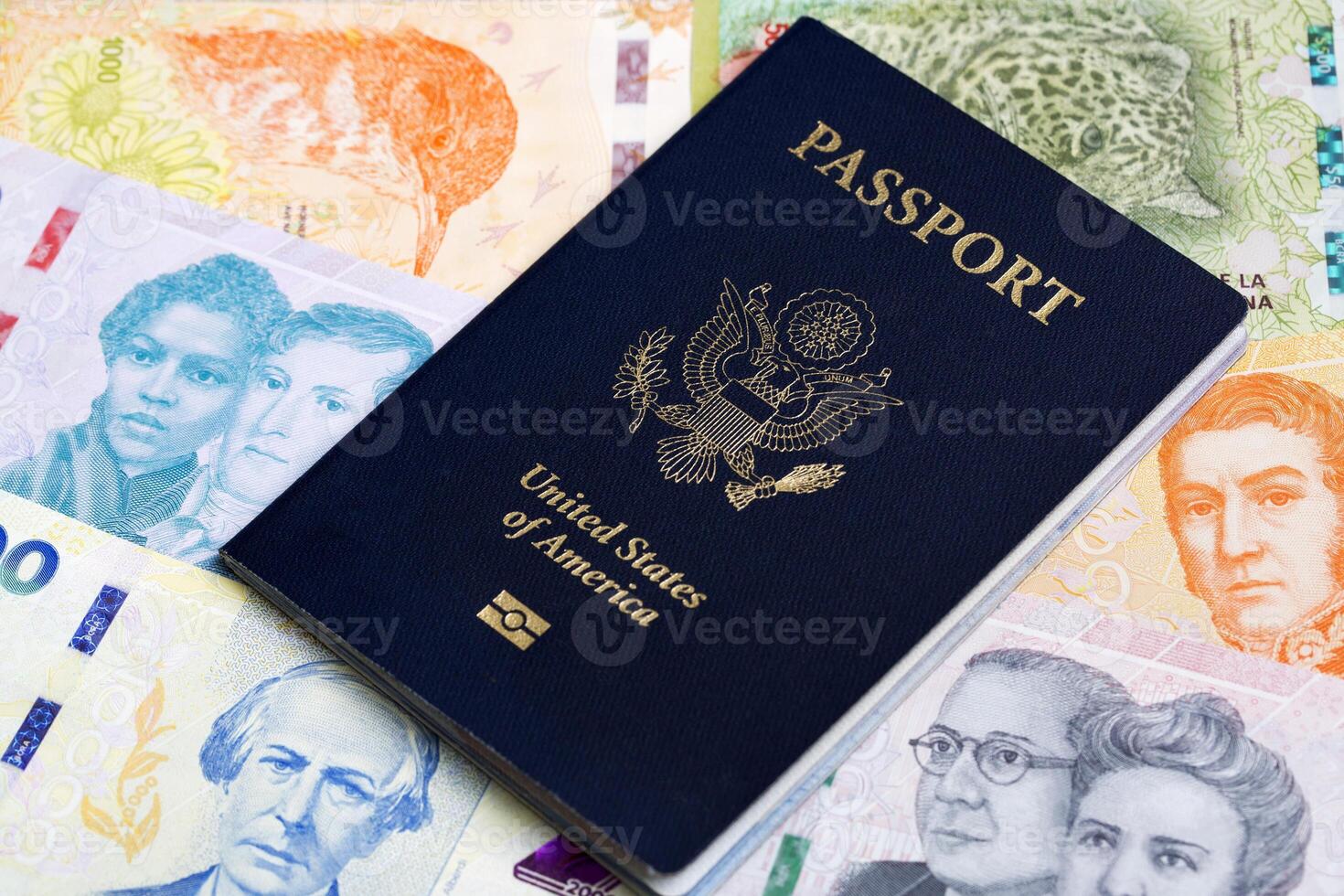 American passport on Argentine Peso photo