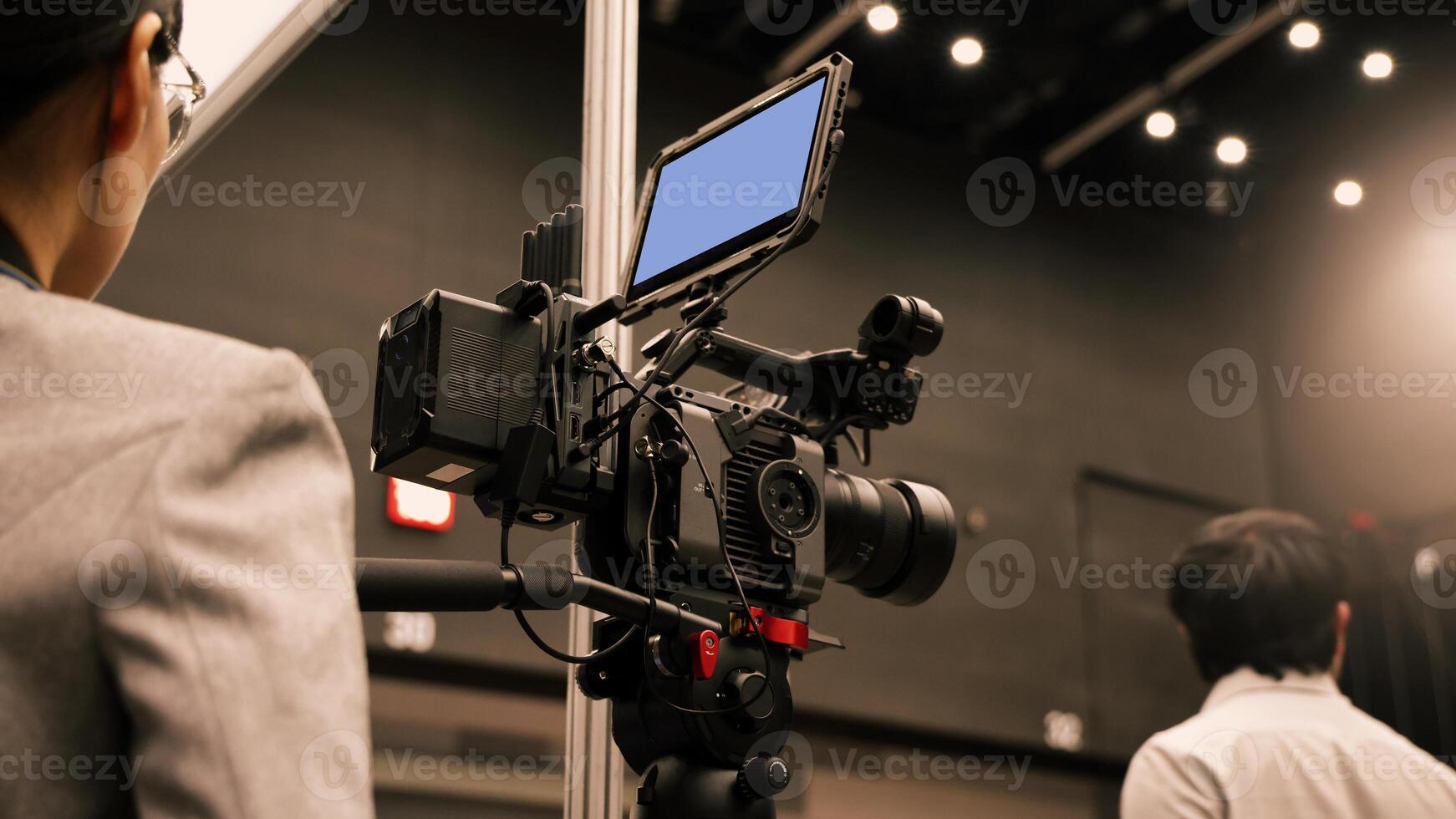 Professional cinema cameras being used in a studio or event setting. High end gear with crew operation and behind the scenes vdo production in action. Camera for Live recording and broadcasting. photo