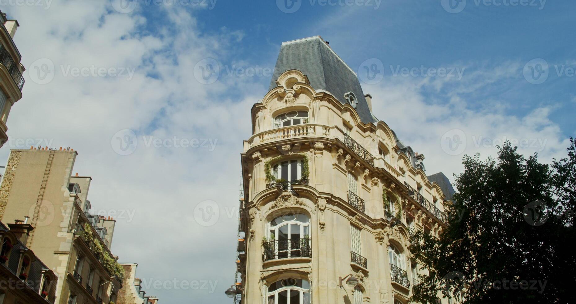 The facade of triangular historical building photo