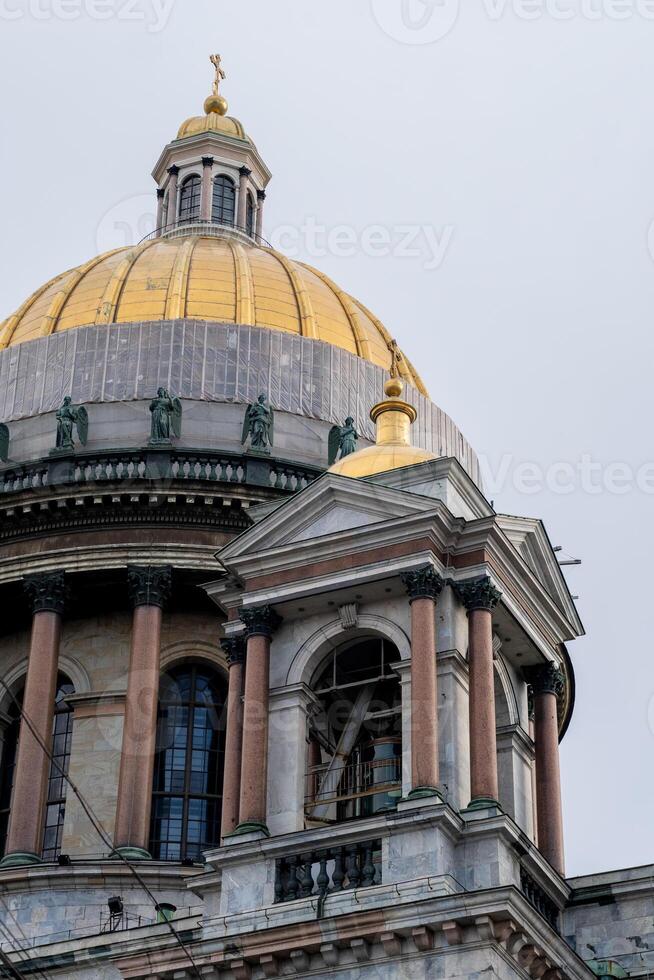 St Isaacs Cathedral Showcasing Its Magnificent Golden Dome and Intricate Architectural Details in St Petersburg, Russia photo