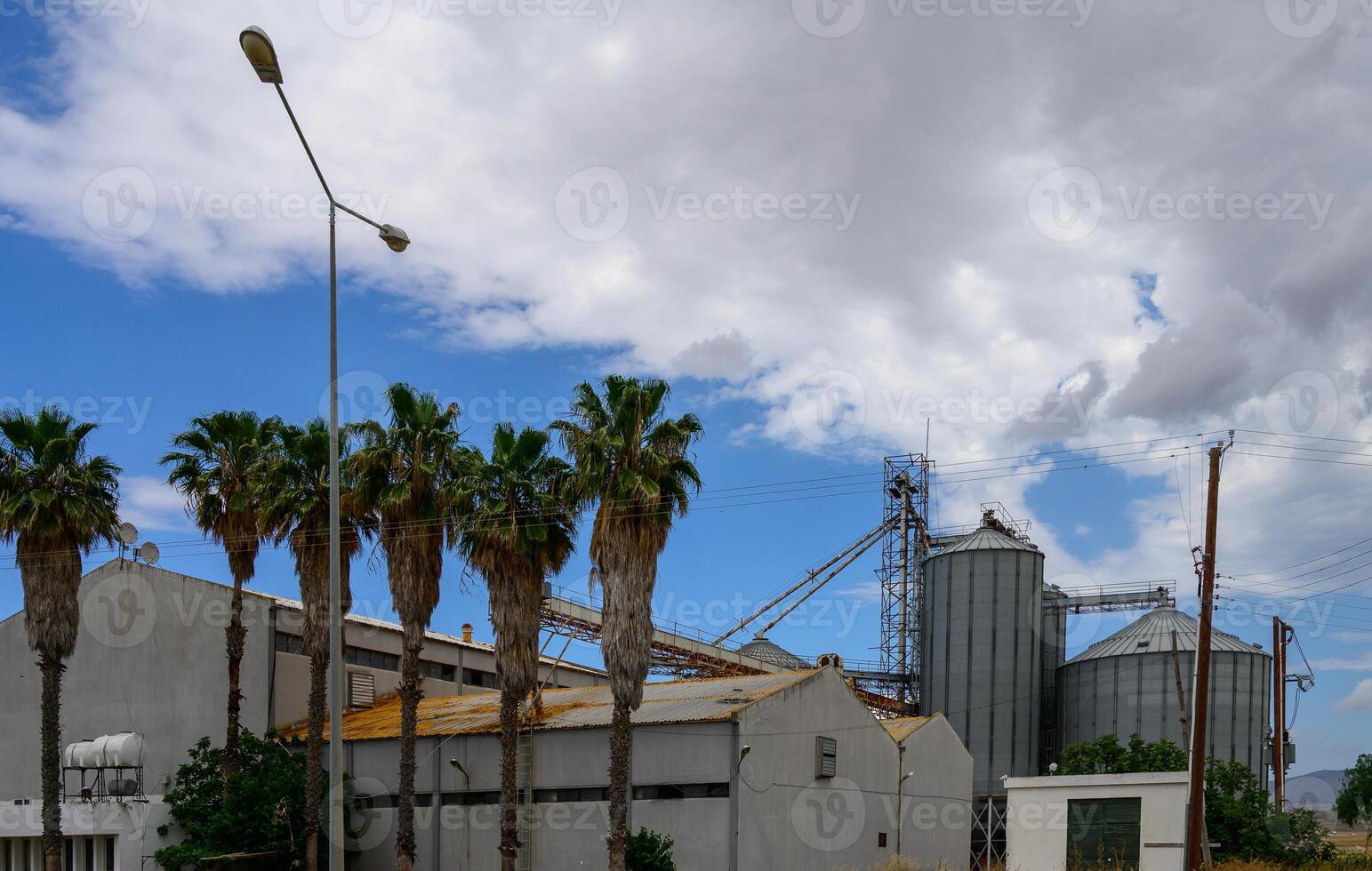 Grain Storage Elevator in Rural Cyprus Landscape photo