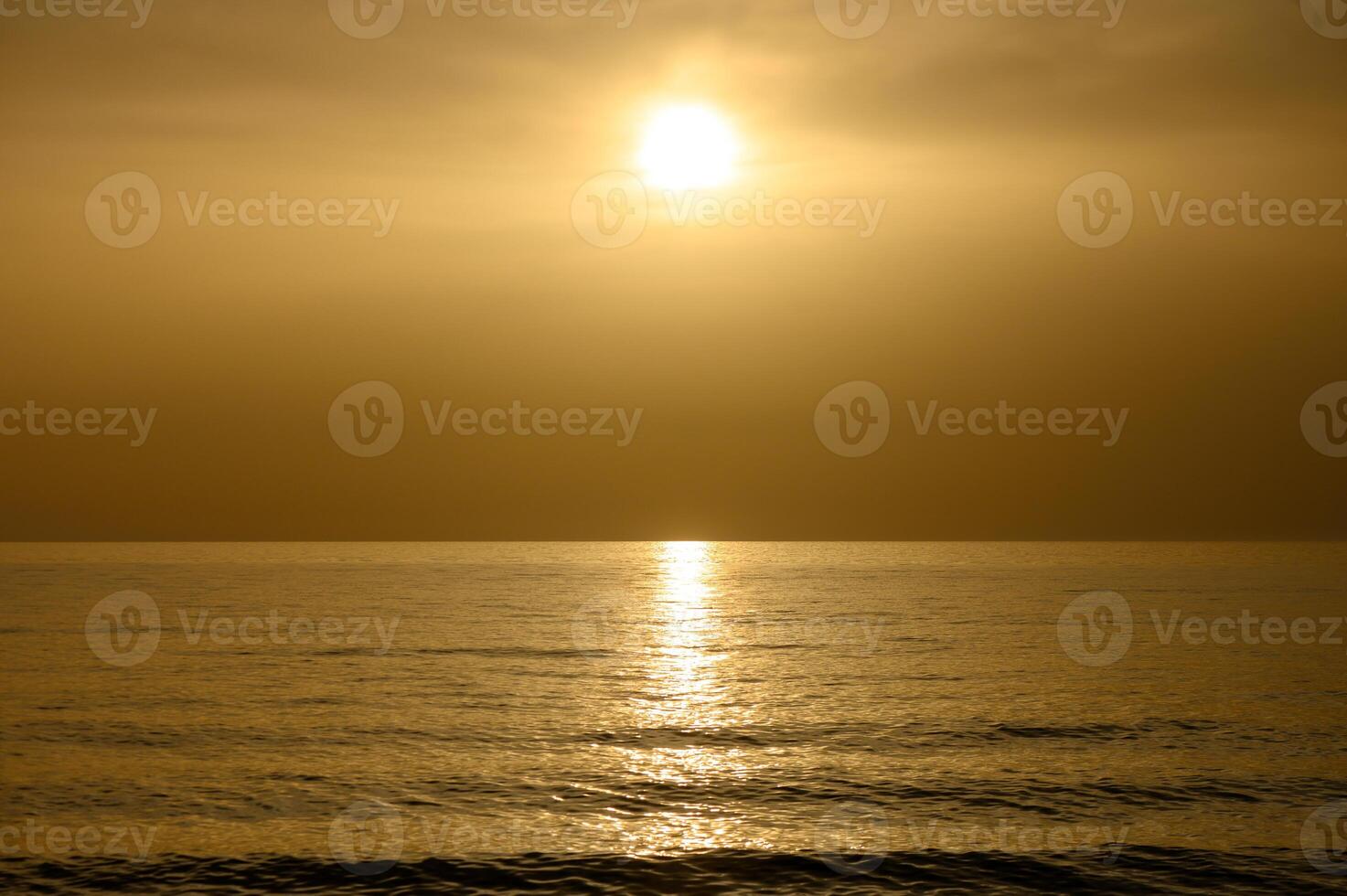 Sunset on the Mediterranean Sea Shore in Cyprus photo
