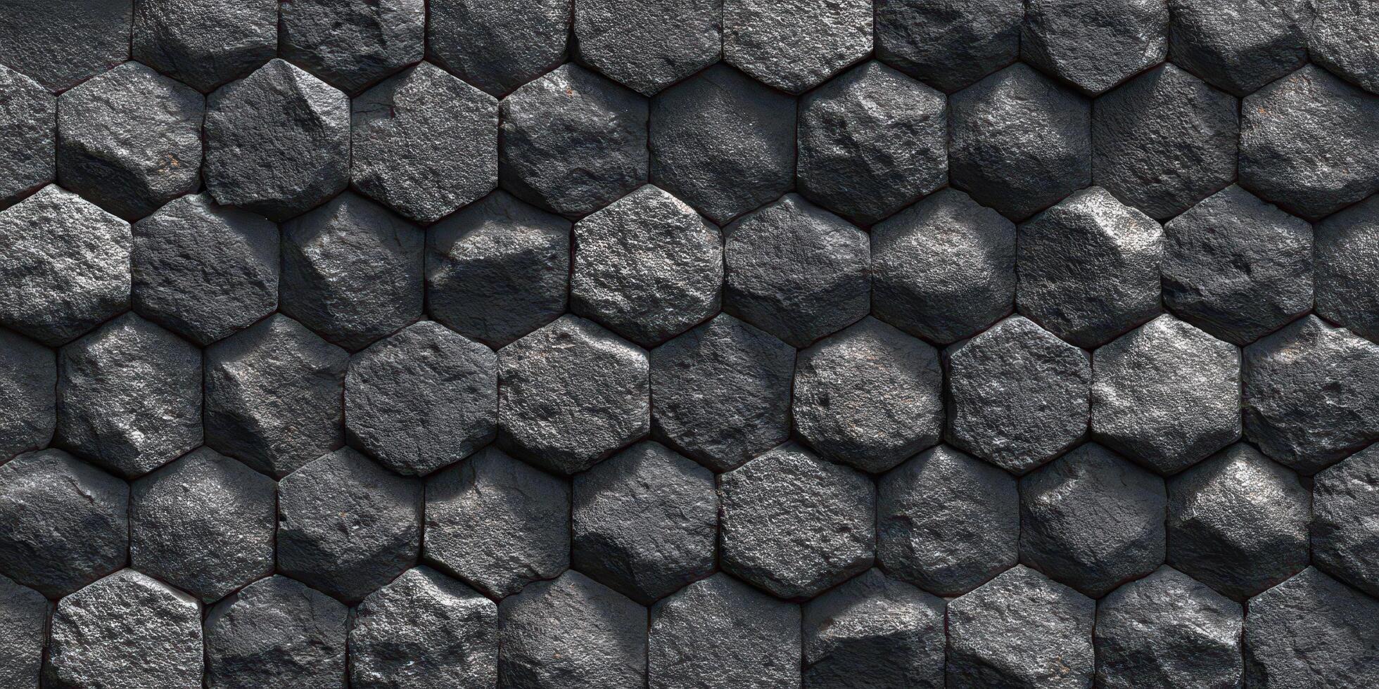 Hexagonal textured stone wall pattern in grayscale photo