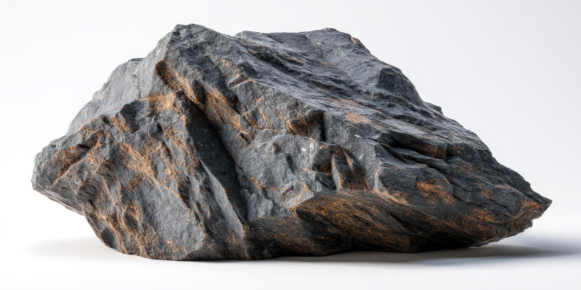 Close up view of rugged dark natural rock stone photo