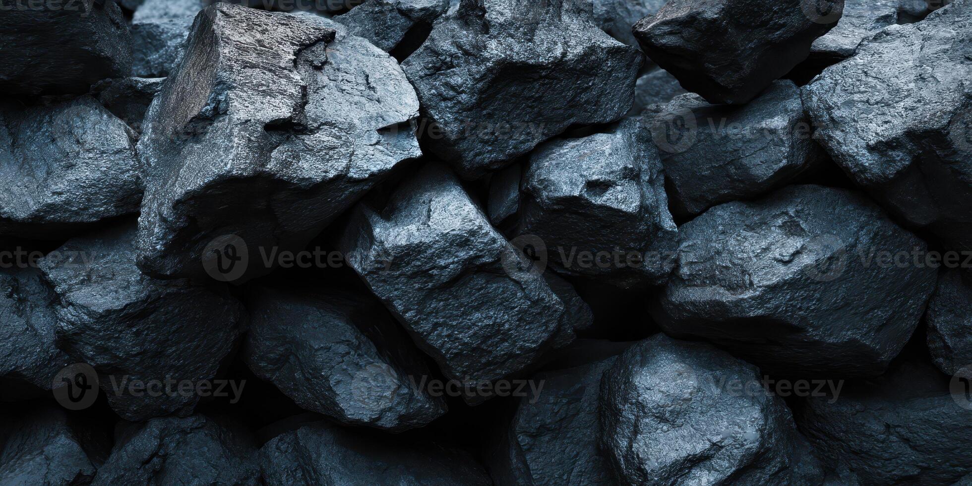 Close up of dark raw coal chunks stacked tightly photo