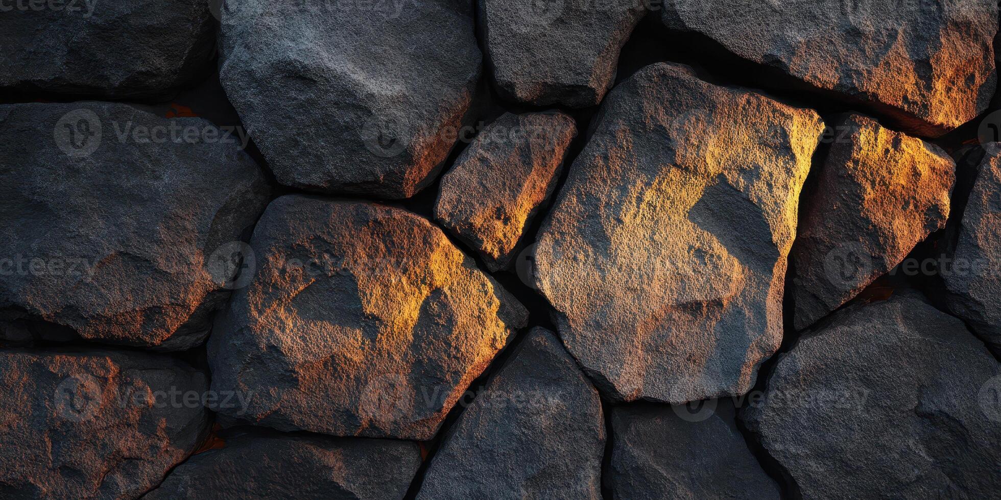 Close up of textured stones with warm sunlight photo