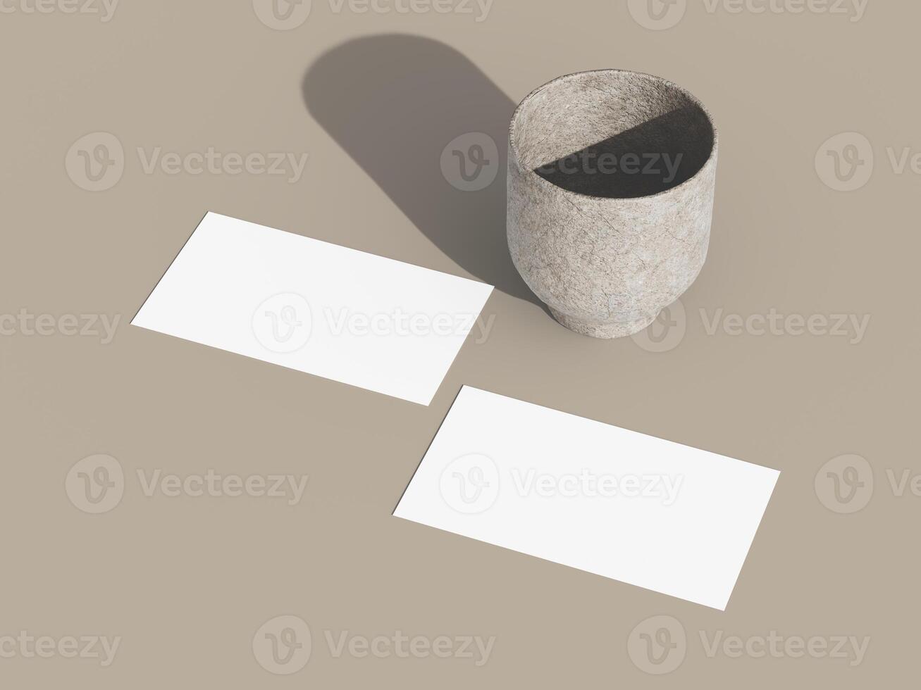 Two business cards on a smooth surface with soft, minimalistic lighting. photo