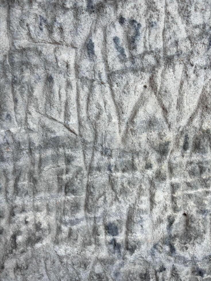 A stone texture that conveys ancient age through a pattern formed over the centuries. photo