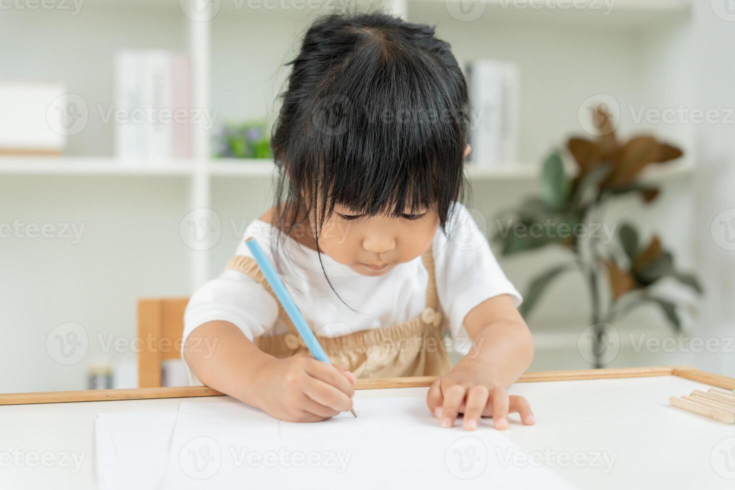 learn drawing picture and cartoon. Funny family is happy and excited in the house. Mother and daughter having fun spending time together. Holiday, Activity photo
